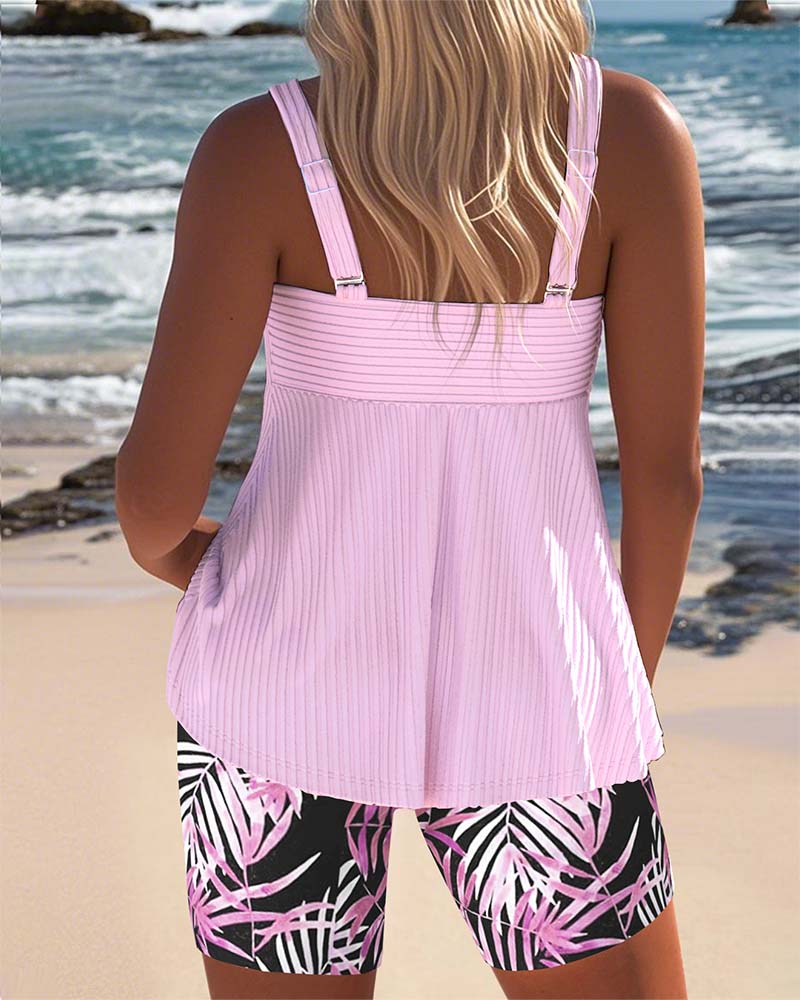 Striped Tankini Top Paired with Printed Beach Shorts