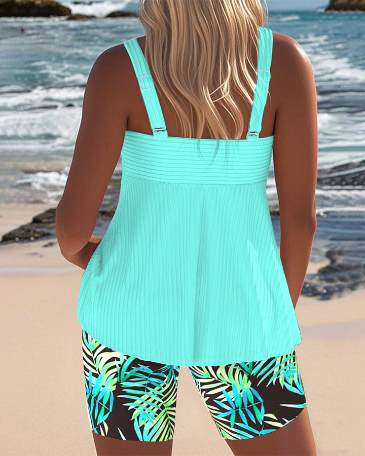 Striped Tankini Top Paired with Printed Beach Shorts